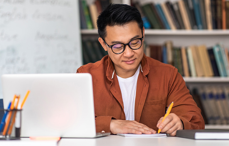 Novelist writing a fiction book on laptop showcasing creative writing and professional author career in 2026